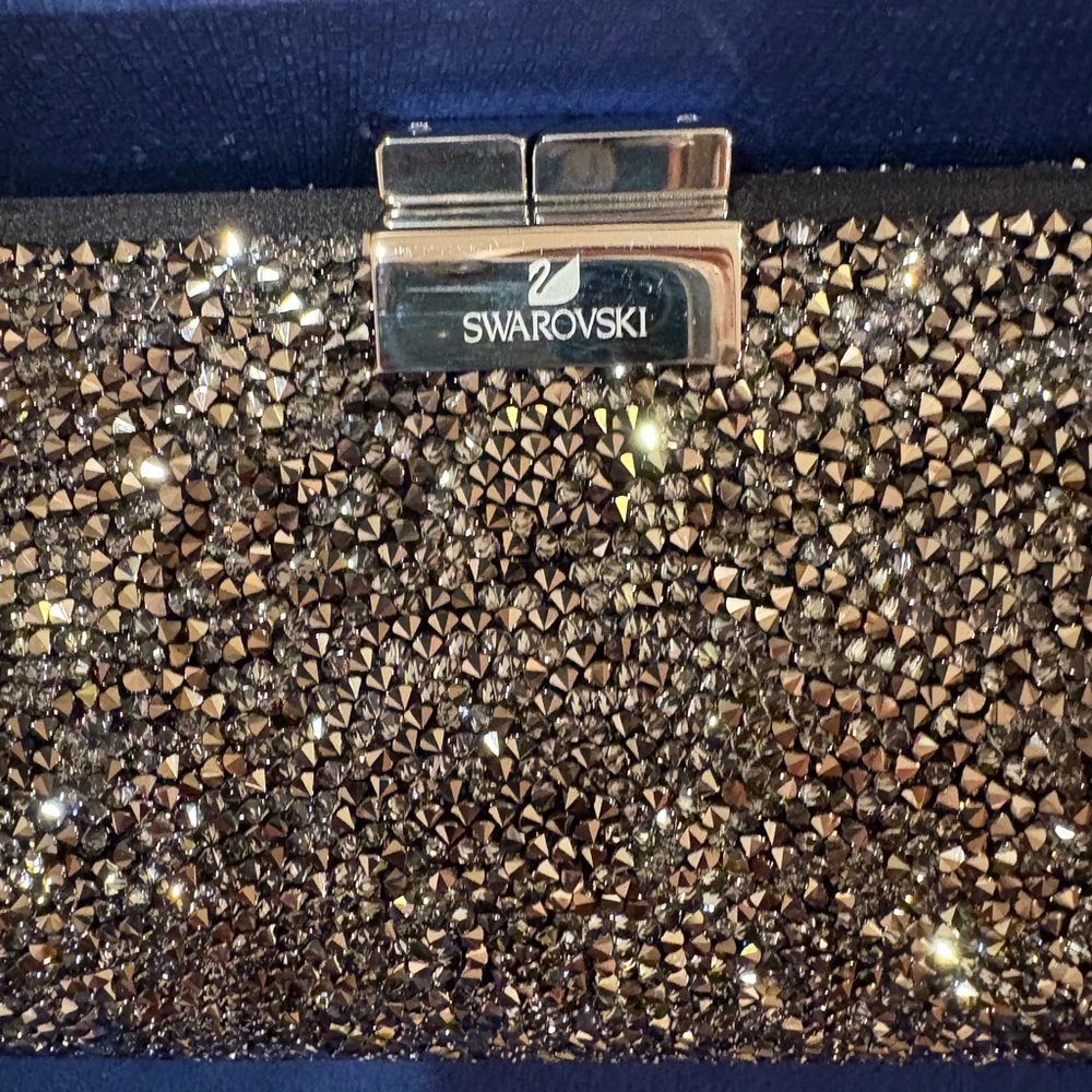 Swarovski Crystal-Embellished Black and Silver Clutch
New in original box - Picture 2 of 5